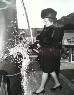 First Lady Neva Egan christens the U.S.S. Juneau