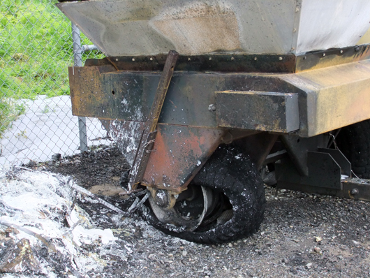 The spreader tires melted from the fire.