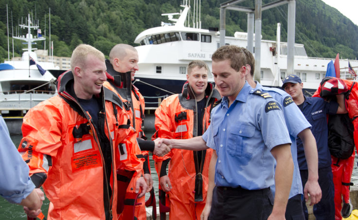 Teams congratulate the team from the Canadian Coast Guard Vessel Bartlett. The team had a winning time of 5:39.