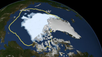 This Sept. 16 image released by NASA shows the amount of summer sea ice in the Arctic, at center in white, and the 1979 to 2000 average extent for the day shown, with the yellow line. Scientists say sea ice in the Arctic shrank to an all-time low of 1.32 million square miles on Sept. 16, smashing old records for the critical climate indicator.