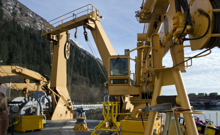 Scientists use the ship's cranes for a variety of things, including scraping the sea floor.