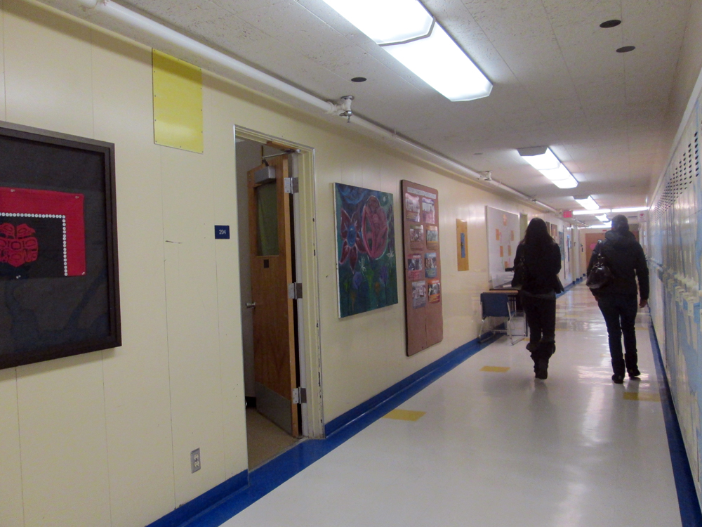 Yaakosge HallwayTwo students walk down the hall at Yaakoosge Daakahidi. Nearly half the students at Yaakoosge are homeless. Two students walk down the hall at Yaakoosge Daakahidi. Nearly half the students at Yaakoosge are homeless.