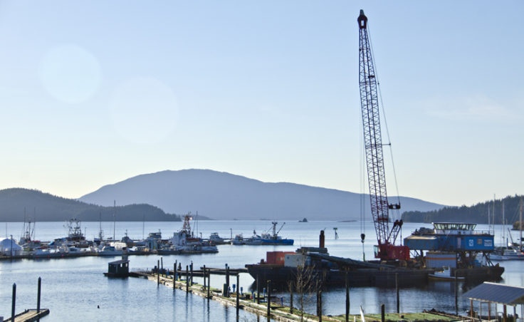 A construction barge is removing the DeHartâs marina in Auke Bay this week. The work is the first phase of the Statter Harbor master plan.