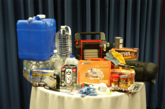 An example of the items a basic home emergency kit should contain.