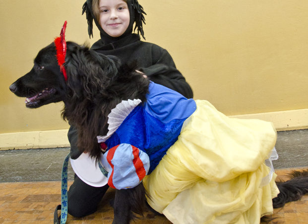Tallulah, 8, and her friend Maximo Wagglebottom, won the costume contest. "He doesn't like wearing it," says Tallulah about the dress Maximo wore. "He was biting it." Ten dogs and one cat took to the stage last Saturday for the Pawsitively Fabulous Pet Fashion Show.