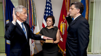 New Defense Secretary Chuck Hagel, left, as he was sworn in Wednesday morning at the Pentagon. His wife, Lilibet, held the Bible. Michael L. Rhodes, the Pentagon's director of administration and management, administered the oath. MC1 Chad J. McNeeley/Office of the Secretary of Defense
