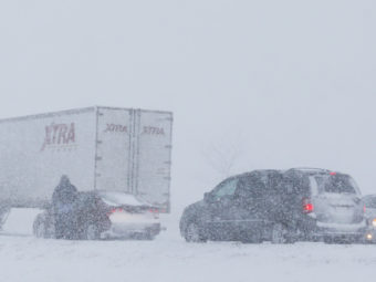 Snowy scene along I-35 near Kansas City on Thursday. Orlin Wagner/Associated Press