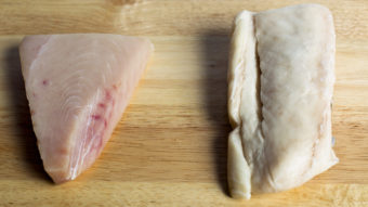 Escolar, right, is often substituted for more expensive Albacore tuna (left), a report on mislabeled seafood found. Yoon S. Byun/Boston Globe via Getty Images