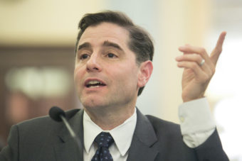 Federal Communications Commission Chairman Julius Genachowski testifies before a Senate committee in March of 2013. T.J. Kirkpatrick/Getty Images