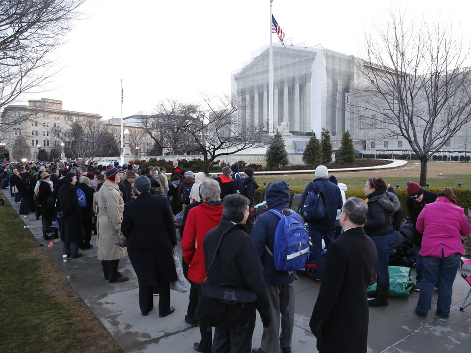 The line was long Tuesday outside the Supreme Court in Washington, D.C., as spectators came to hear the oral arguments about California's Proposition 8. Jonathan Ernst /Reuters /Landov