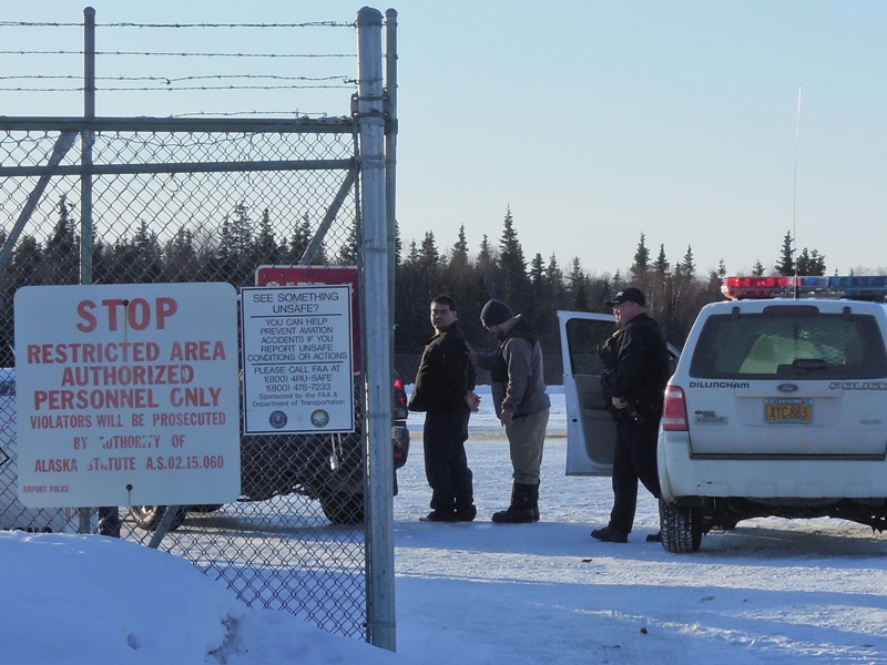 Leroy B. Dick, Jr., 42, in custody at the Dillingham airport. Dick is facing first degree murder charges for the killing of Manokotak VPSO Thomas Madole. Credit Jason Sear, KDLG