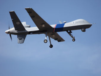 An unmanned drone patrols the U.S.-Canadian border. Attorney General Eric Holder, in a letter to Sen. Rand Paul, R-Ky., said the president could in an "extraordinary circumstance" order a drone strike inside the country. U.S. Customs and Border Protection /AP
