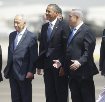 President Barack Obama is greeted by Israeli President Shimon Peres, left, and Israeli Prime Minister Benjamin Netanyahu upon his arrival ceremony at Ben Gurion International Airport in Tel Aviv, Israel, on Wednesday. Pablo Martinez Monsivais/AP