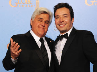 Jay Leno (left) and Jimmy Fallon at the Golden Globe Awards in January. Next year, Fallon will be taking Leno's place on The Tonight Show, NBC says. Kevin Winter/Getty Images