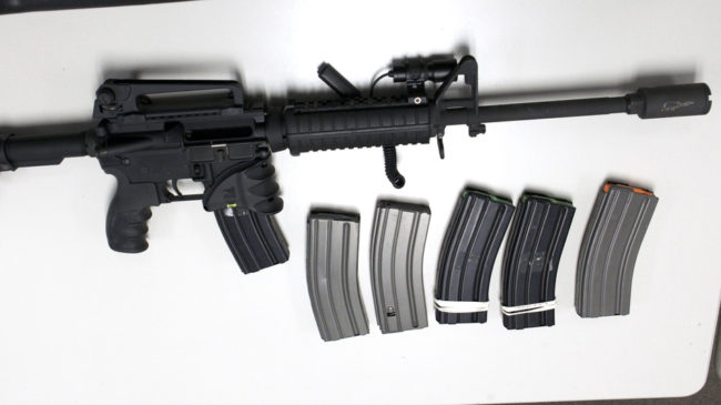 A Bushmaster rifle, similar to the type used by Adam Lanza during the shooting at Sandy Hook Elementary School, and some ammunition magazines. The sale and possession of this type of weapon, and high-capacity magazines, will be severely restricted in Connecticut under new legislation. Michelle McLoughlin /Reuters /Landov