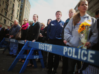 In Boston and other places across the nation, people gathered Monday for a moment of silence to honor the victims of the marathon bombing. Mario Tama/Getty Images