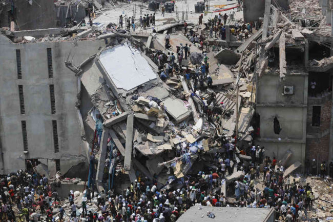 More than 70 people are dead and some 600 injured in the collapse of an eight-story housing garment factories and a shopping center. Andrew Biraj /Reuters /Landov 