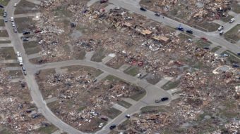An aerial view shows an entire neighborhood destroyed by Monday's tornado in Moore, Okla. Tony Gutierrez/AP