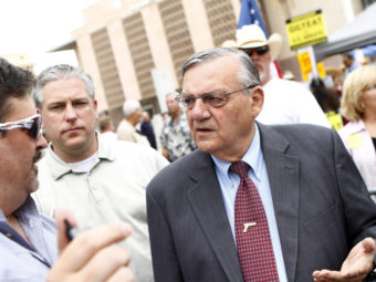 Maricopa County Sheriff Joe Arpaio (right) attends a rally for the Tea Party Express in 2010. Joshua Lott/Getty Images