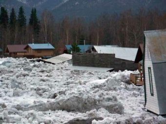 Massive ice blocks and flooding inundate the town of Eagle, Alaska, during the 2009 Alaska floods.