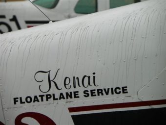 Ash and rain accumulate on a floatplane in Nelson Lagoon. (Courtesy of Merle Brandell)
