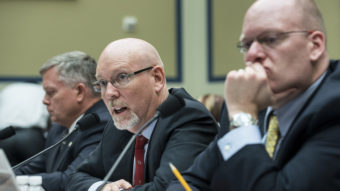 Gregory Hicks testifies Wednesday about the Benghazi attack before the House Committee on Oversight and Government Reform, while Mark Thompson, left, and Eric Nordstrom, listen. Brendan Smialowski/AFP/Getty Images