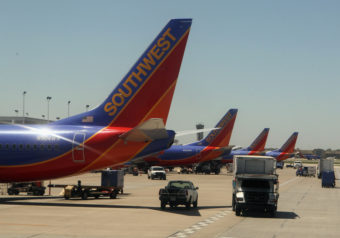 Southwest airline jets are lined up at Long Island MacArthur Islip airport in 2010. Departures at the New York City suburban airport dropped nearly 50 percent between 2007 and 2012, according to an MIT study. Bruce Bennett/Getty Images