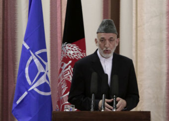 Afghan President Hamid Karzai speaks during a ceremony Tuesday at a military academy on the outskirts of Kabul. Rahmat Gul/AP