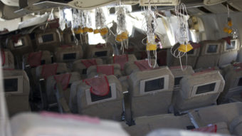 A photo published by the NTSB shows the interior of Asiana Airlines flight 214, which crash-landed at San Francisco's airport Saturday. The investigation into the crash, which killed two people, is continuing. NTSB