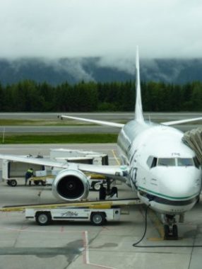 An Alaska Airlines jet waits for boarding at the Juneau Airport last September. Monday's Alaska Flight 69 from Seattle and Ketchikan was delayed about an hour by the computer outage. File photo.
