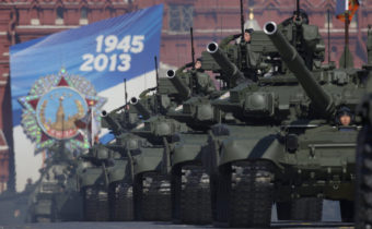 Russian tanks move along Red Square during a Victory Day parade in May. This week, Russia invited the U.S. to participate in a tank biathlon. Ivan Sekretarev/AP