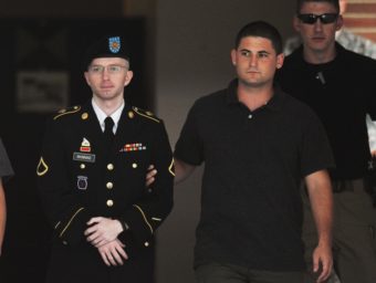 Army Pfc. Bradley Manning is escorted from court on July 25, in Fort Meade, Md. Mandel Ngan/AFP/Getty Images