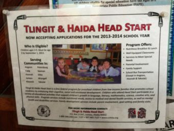 Head Start advertisement is posted on a community bulletin board in Petersburg. The program will delay opening three weeks due to budget cuts.