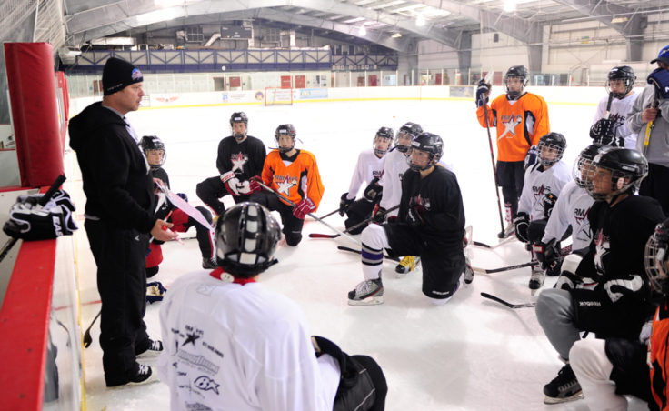 Chad Macleod addresses of players attending the five-day Rocky Mountain Hockey School camp at Treadwell Ice Arena.