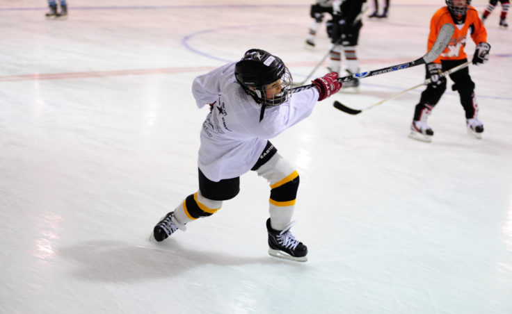 Gage Cooney unleashes a shot during one of the drills of the Rocky Mountain Hockey School at Treadwell Ice Arena