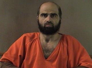 Maj. Nidal Hasan faces 13 charges of murder and 32 of attempted murder for the November 2009 shootings at Fort Hood, Texas. Reuters/Landov