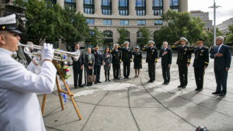 One day after 12 people and an alleged gunman died at the Navy Yard in Washington, D.C., details about their lives are beginning to emerge. On Tuesday, Defense Secretary Chuck Hagel (far right) attends a wreath-laying ceremony at the U.S. Navy Memorial in honor of the victims. Drew Angerer/Getty Images
