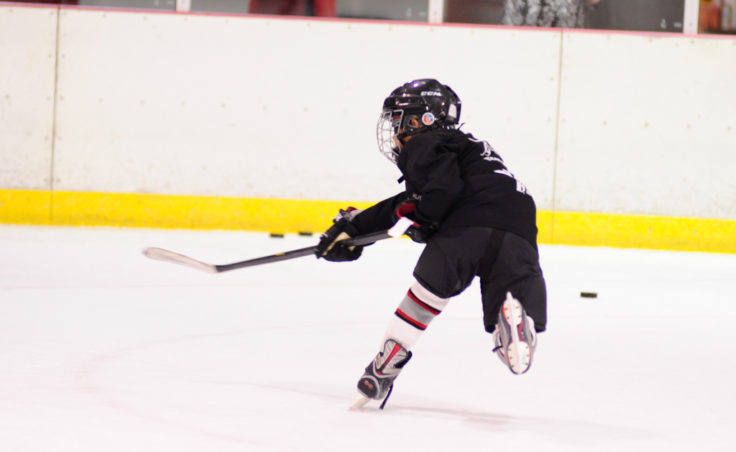 Tezah Haddock unleashes a shot during a drill that required the player to collect a pass, skate toward the net and shoot.