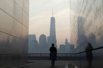 A woman looks out at One World Trade Center from inside the 9/11 Empty Sky memorial at Liberty State Park in Jersey City, N.J. on Wednesday. Americans will commemorate the 12th anniversary of the Sept. 11 attacks with solemn ceremonies and pledges to not forget the nearly 3,000 killed when hijacked jetliners crashed into the World Trade Center, the Pentagon, and a Pennsylvania field. Gary Hershorn/Reuters/Landov