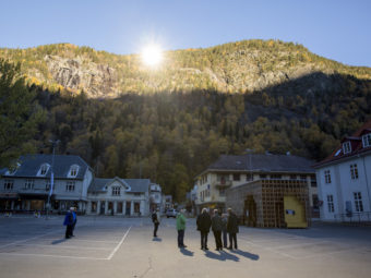 People gathered on a spot in front of the town hall of Rjukan, Norway, last week, where mirrors have focused sunlight. AFP/Getty Images