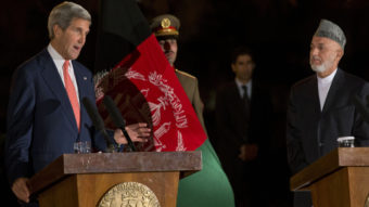 Secretary of State John Kerry describes a new partial bilateral security agreement with Afghanistan, in a news conference held Saturday after hours of discussions with Afghan President Hamid Karzai, right. AFP/AFP/Getty Images