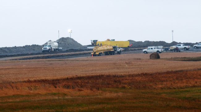 Cleanup went on Friday at the site of an oil pipeline leak and spill north of Tioga, N.D. Officials took nearly two weeks to tell the public about the break in a Tesoro Corp. pipeline. Kevin Cederstrom/AP
