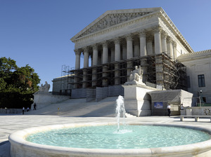 The Supreme Court is expected to take up the case on the greenhouse gas permits for large polluters early next year. Susan Walsh/AP