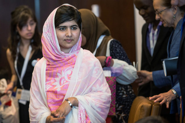 Malala Yousafzai, the 16-year-old Pakistani advocate for girls education who was shot in the head by the Taliban, attends a conversation with the United Nations Secretary General Ban-ki Moon and other youth delegates. Andrew Burton/Getty Images