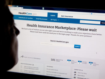 A woman looks at the HealthCare.gov insurance exchange internet site October 1, 2013. Karen Bleier/AFP/Getty Images