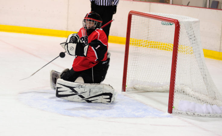 Juneau goalie Liam McDermott stops one of 24 Soldotna shots in Saturday’s game at Treadwell Ice Arena.