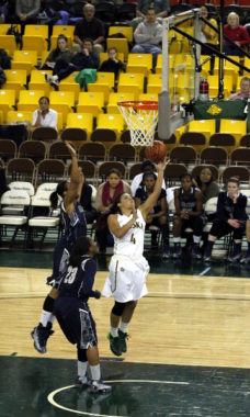 UAA’s Alli Madison goes in for a layup against Georgetown in the Great Alaska Shootout championship. Photo by Josh Edge, APRN – Anchorage.