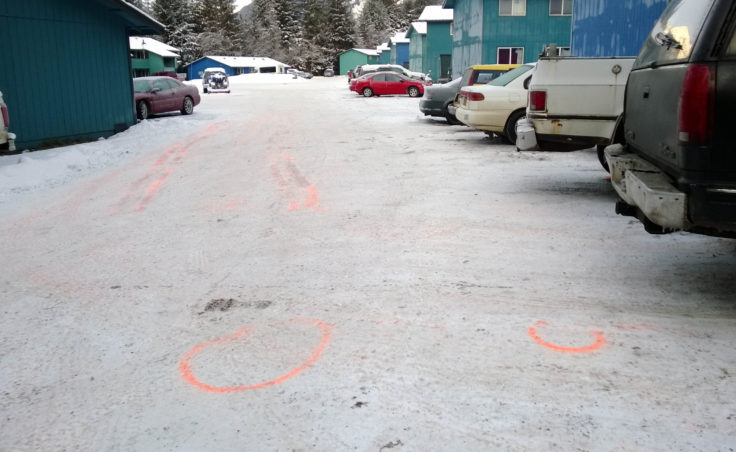 Investigators mapped out possible vehicle paths related to a shooting Friday at the south end of the Coho Park Apartments. (Photo by Jeremy Hsieh/KTOO)
