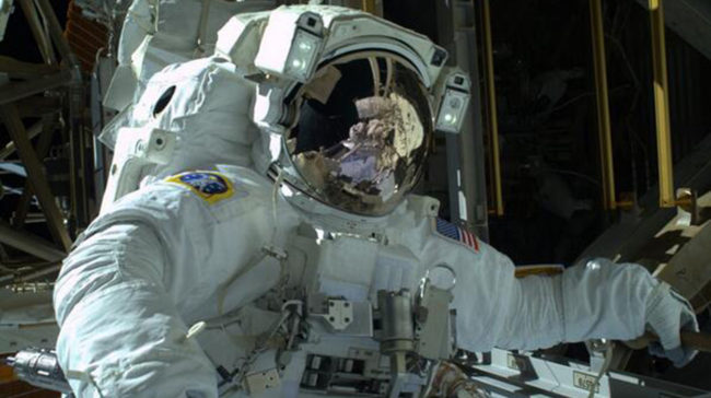 Astronaut Mike Hopkins during Saturday's spacewalk. He's going out again Tuesday. Photo courtesy of NASA.gov