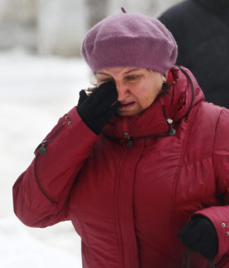 A woman wiped away tears Monday in Volgograd, Russia, after the second suicide bombing in that city in the past two days. Denis Tyrin/AP